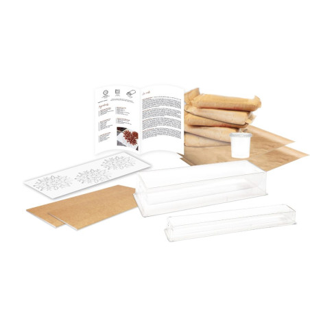 Boxed set of 3 chocolate Yule logs with ingredients and utensils