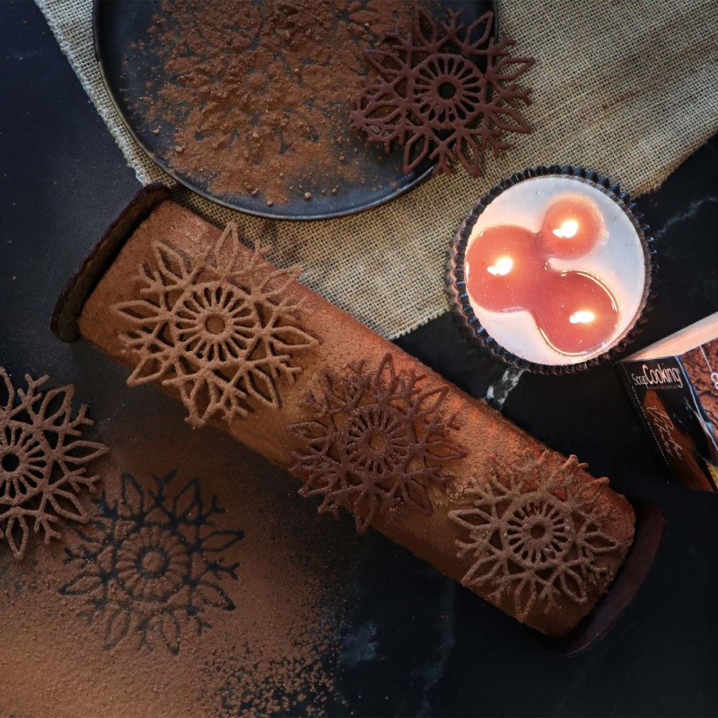 Boxed set of 3 chocolate Yule logs with ingredients and utensils